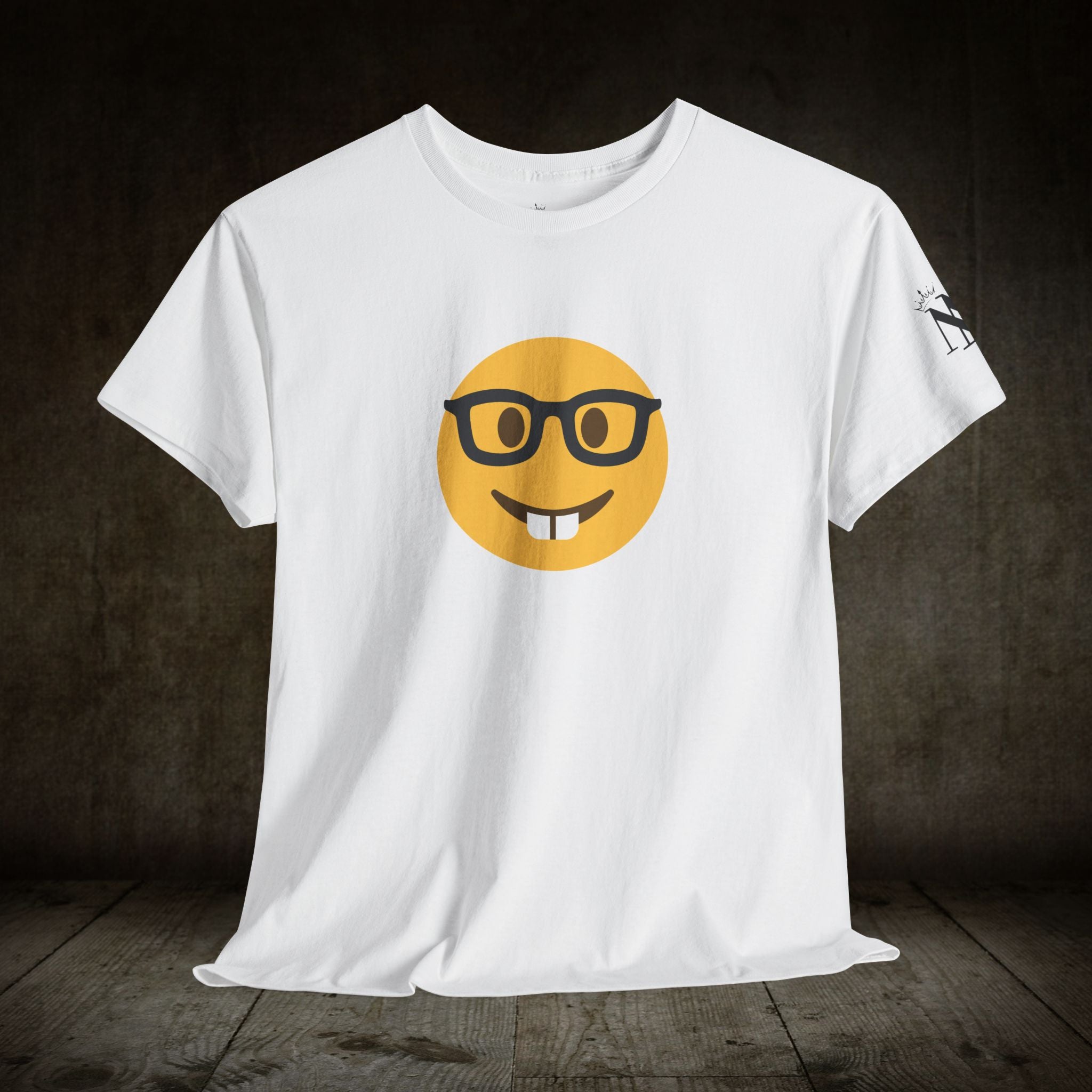 White adult t-shirt featuring a playful nerd emoji with glasses and buck teeth. Bold and cheeky design for fun and flirty wear.