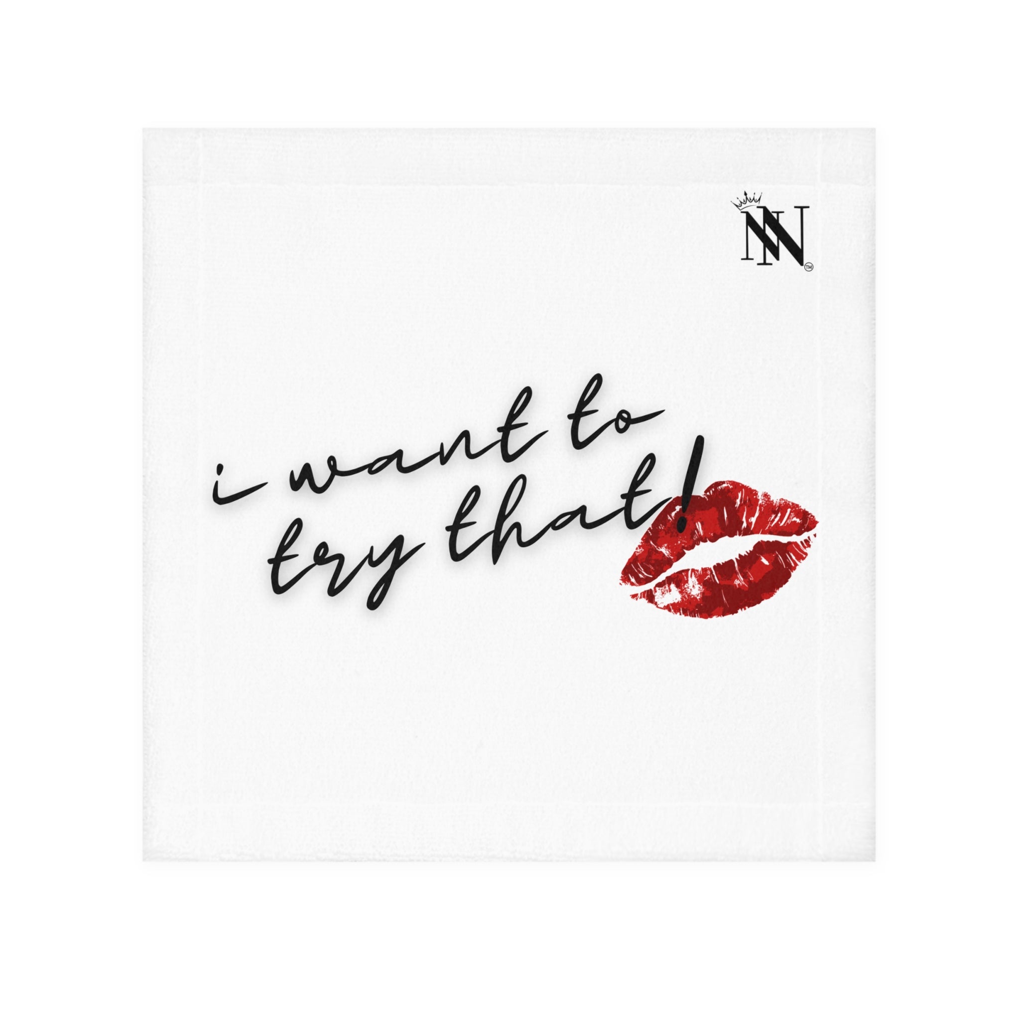 White hand towel with the phrase 'I want to try that!' in black script and a red lipstick kiss design, perfect for intimate moments.