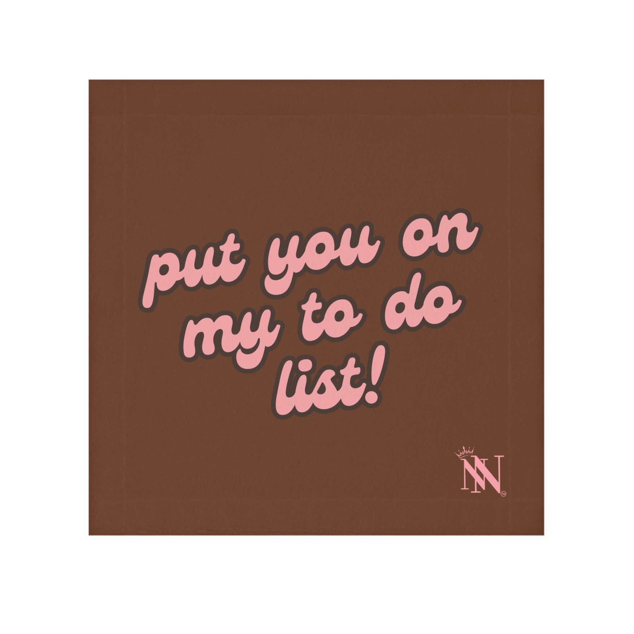 Brown hand towel with pink text reading 'Put You on My to Do List!' and a small logo in the corner. Fun and flirty design for intimate moments.